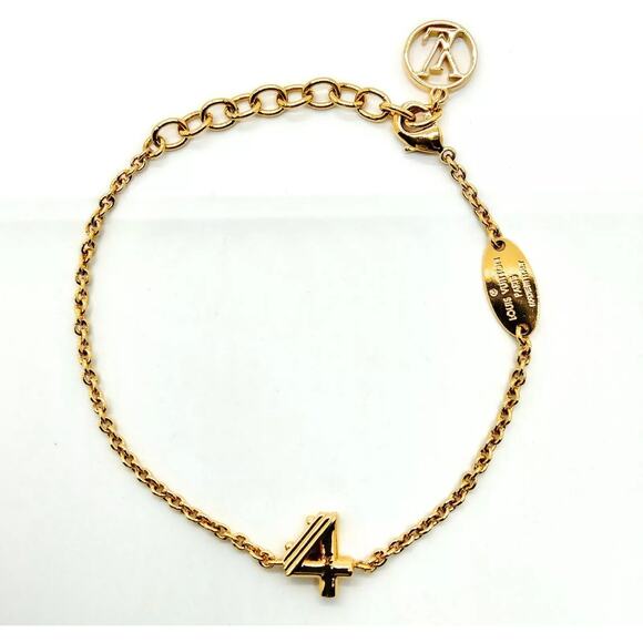 LOUIS VUITTON AUTHENTIC Goldtone Metal LV Me Number 4 Bracelet